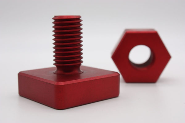 Open House Sample Part - Red bolt with nut separated - rossmachine.com